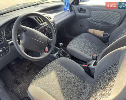 Чорний Деу Ланос, об'ємом двигуна 1.5 л та пробігом 201 тис. км за 1700 $, фото 2 на Automoto.ua