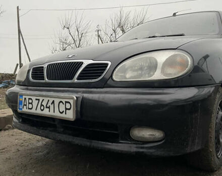 Черный Дэу Ланос, объемом двигателя 1.5 л и пробегом 150 тыс. км за 2000 $, фото 2 на Automoto.ua