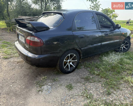Черный Дэу Ланос, объемом двигателя 1.6 л и пробегом 275 тыс. км за 1700 $, фото 4 на Automoto.ua