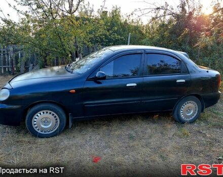 Черный Дэу Ланос, объемом двигателя 1.5 л и пробегом 253 тыс. км за 2300 $, фото 1 на Automoto.ua