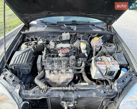 Черный Дэу Ланос, объемом двигателя 1.5 л и пробегом 190 тыс. км за 1350 $, фото 10 на Automoto.ua