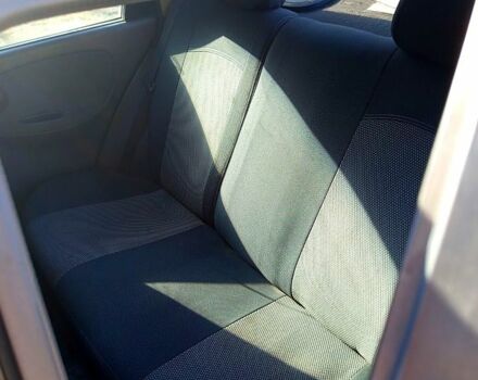 Черный Дэу Ланос, объемом двигателя 1.6 л и пробегом 380 тыс. км за 2300 $, фото 2 на Automoto.ua