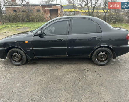 Черный Дэу Ланос, объемом двигателя 1.5 л и пробегом 201 тыс. км за 1000 $, фото 1 на Automoto.ua