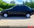 Черный Дэу Ланос, объемом двигателя 1.5 л и пробегом 255 тыс. км за 3200 $, фото 2 на Automoto.ua