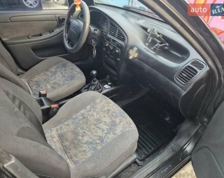 Деу Ланос 2007 у Новомосковске на Automoto.ua Чорний Деу Ланос, об'ємом двигуна 1.5 л та пробігом 252 тис. км за 2500 $, фото 14 на Automoto.ua