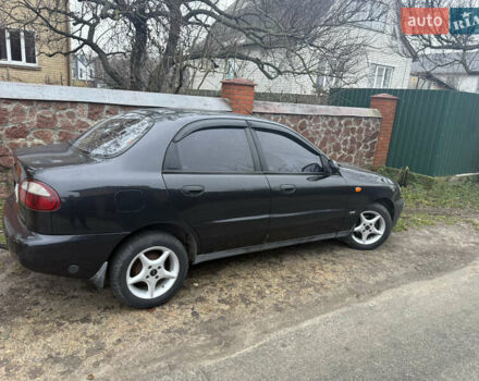 Чорний Деу Ланос, об'ємом двигуна 1.5 л та пробігом 175 тис. км за 2600 $, фото 1 на Automoto.ua