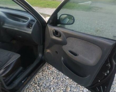 Черный Дэу Ланос, объемом двигателя 1.4 л и пробегом 140 тыс. км за 2200 $, фото 9 на Automoto.ua