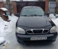 Чорний Деу Ланос, об'ємом двигуна 1.5 л та пробігом 250 тис. км за 1900 $, фото 1 на Automoto.ua