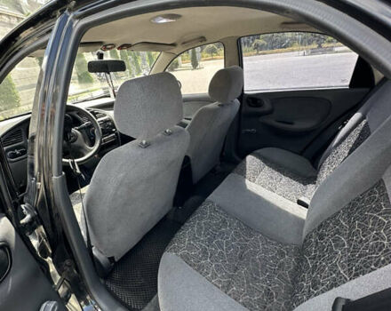 Деу Ланос 2007 у Кропивницькому (Кіровограді) на Automoto.ua Чорний Деу Ланос, об'ємом двигуна 1.5 л та пробігом 180 тис. км за 2899 $, фото 8 на Automoto.ua