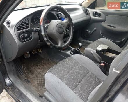 Черный Дэу Ланос, объемом двигателя 1.5 л и пробегом 141 тыс. км за 1700 $, фото 4 на Automoto.ua