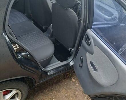 Черный Дэу Ланос, объемом двигателя 1.5 л и пробегом 158 тыс. км за 1250 $, фото 13 на Automoto.ua