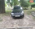 Чорний Деу Ланос, об'ємом двигуна 1.5 л та пробігом 200 тис. км за 2250 $, фото 1 на Automoto.ua