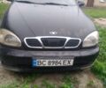 Черный Дэу Ланос, объемом двигателя 1.5 л и пробегом 235 тыс. км за 1300 $, фото 1 на Automoto.ua