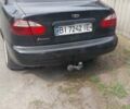 Чорний Деу Ланос, об'ємом двигуна 1.5 л та пробігом 165 тис. км за 2600 $, фото 3 на Automoto.ua