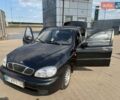 Черный Дэу Ланос, объемом двигателя 1.5 л и пробегом 212 тыс. км за 2600 $, фото 1 на Automoto.ua