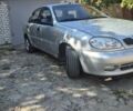Черный Дэу Ланос, объемом двигателя 1.5 л и пробегом 255 тыс. км за 2500 $, фото 1 на Automoto.ua