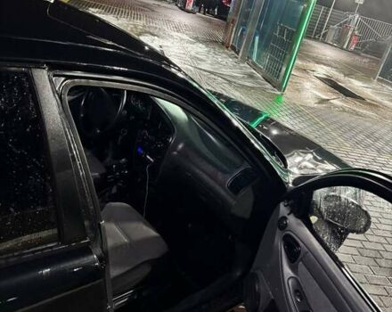 Черный Дэу Ланос, объемом двигателя 1.5 л и пробегом 210 тыс. км за 2199 $, фото 9 на Automoto.ua