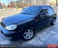Черный Дэу Ланос, объемом двигателя 1.5 л и пробегом 200 тыс. км за 2700 $, фото 1 на Automoto.ua