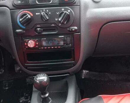 Черный Дэу Ланос, объемом двигателя 1.5 л и пробегом 224 тыс. км за 1499 $, фото 12 на Automoto.ua