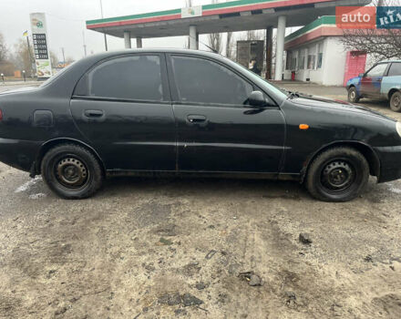 Черный Дэу Ланос, объемом двигателя 1.5 л и пробегом 201 тыс. км за 1000 $, фото 2 на Automoto.ua
