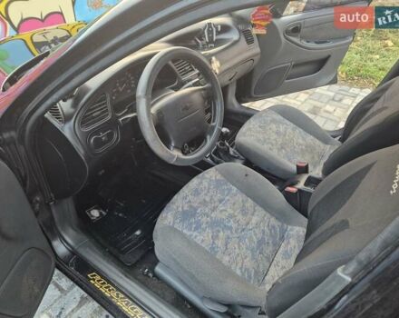 Деу Ланос 2007 у Новомосковске на Automoto.ua Чорний Деу Ланос, об'ємом двигуна 1.5 л та пробігом 252 тис. км за 2500 $, фото 11 на Automoto.ua