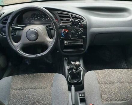 Черный Дэу Ланос, объемом двигателя 1.5 л и пробегом 198 тыс. км за 3200 $, фото 2 на Automoto.ua