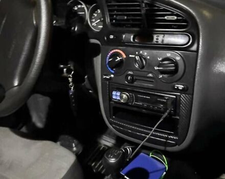 Черный Дэу Ланос, объемом двигателя 1.5 л и пробегом 210 тыс. км за 2199 $, фото 11 на Automoto.ua