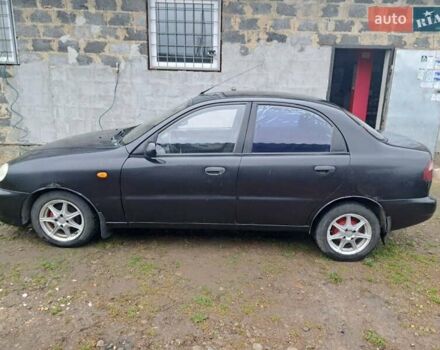 Черный Дэу Ланос, объемом двигателя 1.5 л и пробегом 158 тыс. км за 1250 $, фото 1 на Automoto.ua