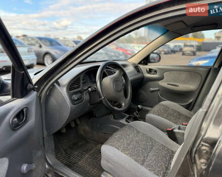 Деу Ланос 2007 у Славуте на Automoto.ua Чорний Деу Ланос, об'ємом двигуна 1.5 л та пробігом 209 тис. км за 1050 $, фото 4 на Automoto.ua