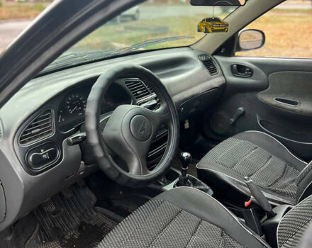 Дэу Ланос 2007 в Краматорске на Automoto.ua Черный Дэу Ланос, объемом двигателя 1.5 л и пробегом 150 тыс. км за 2100 $, фото 6 на Automoto.ua
