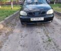 Черный Дэу Ланос, объемом двигателя 1.5 л и пробегом 300 тыс. км за 750 $, фото 1 на Automoto.ua