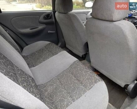 Черный Дэу Ланос, объемом двигателя 1.5 л и пробегом 141 тыс. км за 1700 $, фото 6 на Automoto.ua