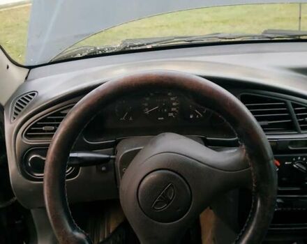 Черный Дэу Ланос, объемом двигателя 1.4 л и пробегом 140 тыс. км за 2200 $, фото 20 на Automoto.ua