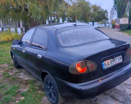 Черный Дэу Ланос, объемом двигателя 1.5 л и пробегом 289 тыс. км за 1700 $, фото 3 на Automoto.ua