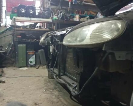 Черный Дэу Ланос, объемом двигателя 1.5 л и пробегом 337 тыс. км за 2600 $, фото 5 на Automoto.ua