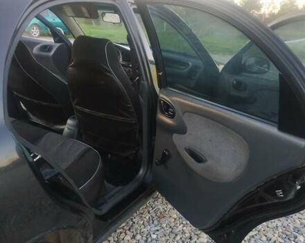 Черный Дэу Ланос, объемом двигателя 1.4 л и пробегом 140 тыс. км за 2200 $, фото 8 на Automoto.ua