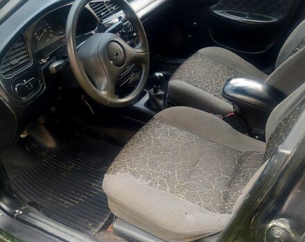 Черный Дэу Ланос, объемом двигателя 1.5 л и пробегом 536 тыс. км за 1000 $, фото 3 на Automoto.ua