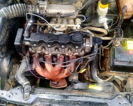 Черный Дэу Ланос, объемом двигателя 1.5 л и пробегом 536 тыс. км за 1000 $, фото 2 на Automoto.ua