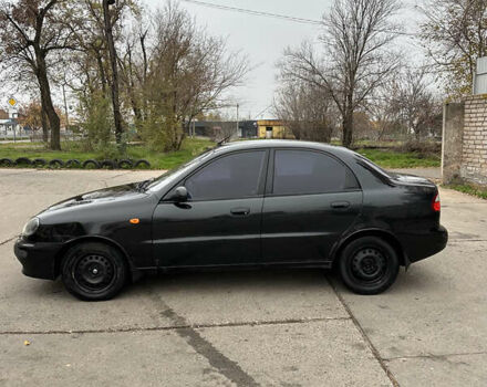 Черный Дэу Ланос, объемом двигателя 1.6 л и пробегом 140 тыс. км за 2700 $, фото 3 на Automoto.ua