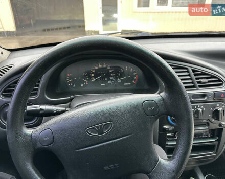 Черный Дэу Ланос, объемом двигателя 1.6 л и пробегом 140 тыс. км за 2700 $, фото 10 на Automoto.ua