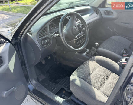 Черный Дэу Ланос, объемом двигателя 1.5 л и пробегом 190 тыс. км за 1350 $, фото 6 на Automoto.ua