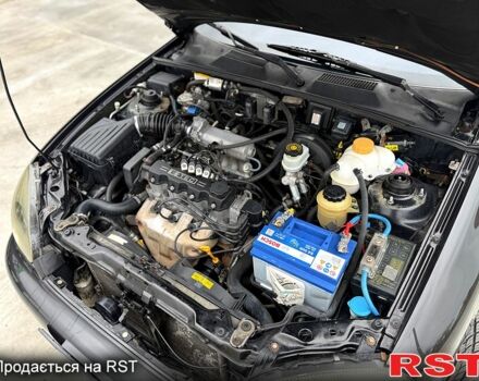 Чорний Деу Ланос, об'ємом двигуна 1.5 л та пробігом 240 тис. км за 2750 $, фото 10 на Automoto.ua