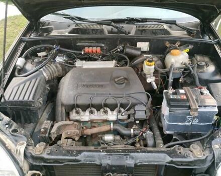 Черный Дэу Ланос, объемом двигателя 1.4 л и пробегом 140 тыс. км за 2200 $, фото 17 на Automoto.ua