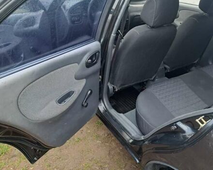 Черный Дэу Ланос, объемом двигателя 1.5 л и пробегом 158 тыс. км за 1250 $, фото 10 на Automoto.ua