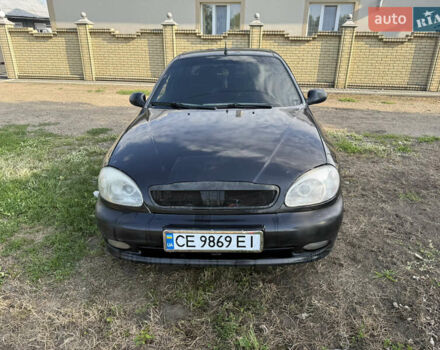 Черный Дэу Ланос, объемом двигателя 1.6 л и пробегом 275 тыс. км за 1700 $, фото 1 на Automoto.ua