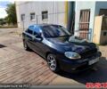 Чорний Деу Ланос, об'ємом двигуна 1.4 л та пробігом 222 тис. км за 2100 $, фото 1 на Automoto.ua