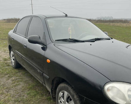 Черный Дэу Ланос, объемом двигателя 1.5 л и пробегом 150 тыс. км за 2000 $, фото 7 на Automoto.ua