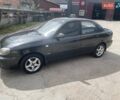 Черный Дэу Ланос, объемом двигателя 1.5 л и пробегом 270 тыс. км за 2000 $, фото 1 на Automoto.ua