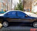 Черный Дэу Ланос, объемом двигателя 1.4 л и пробегом 155 тыс. км за 1600 $, фото 1 на Automoto.ua