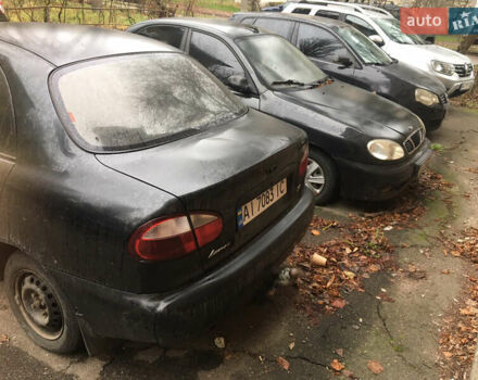 Чорний Деу Ланос, об'ємом двигуна 1.39 л та пробігом 200 тис. км за 900 $, фото 4 на Automoto.ua